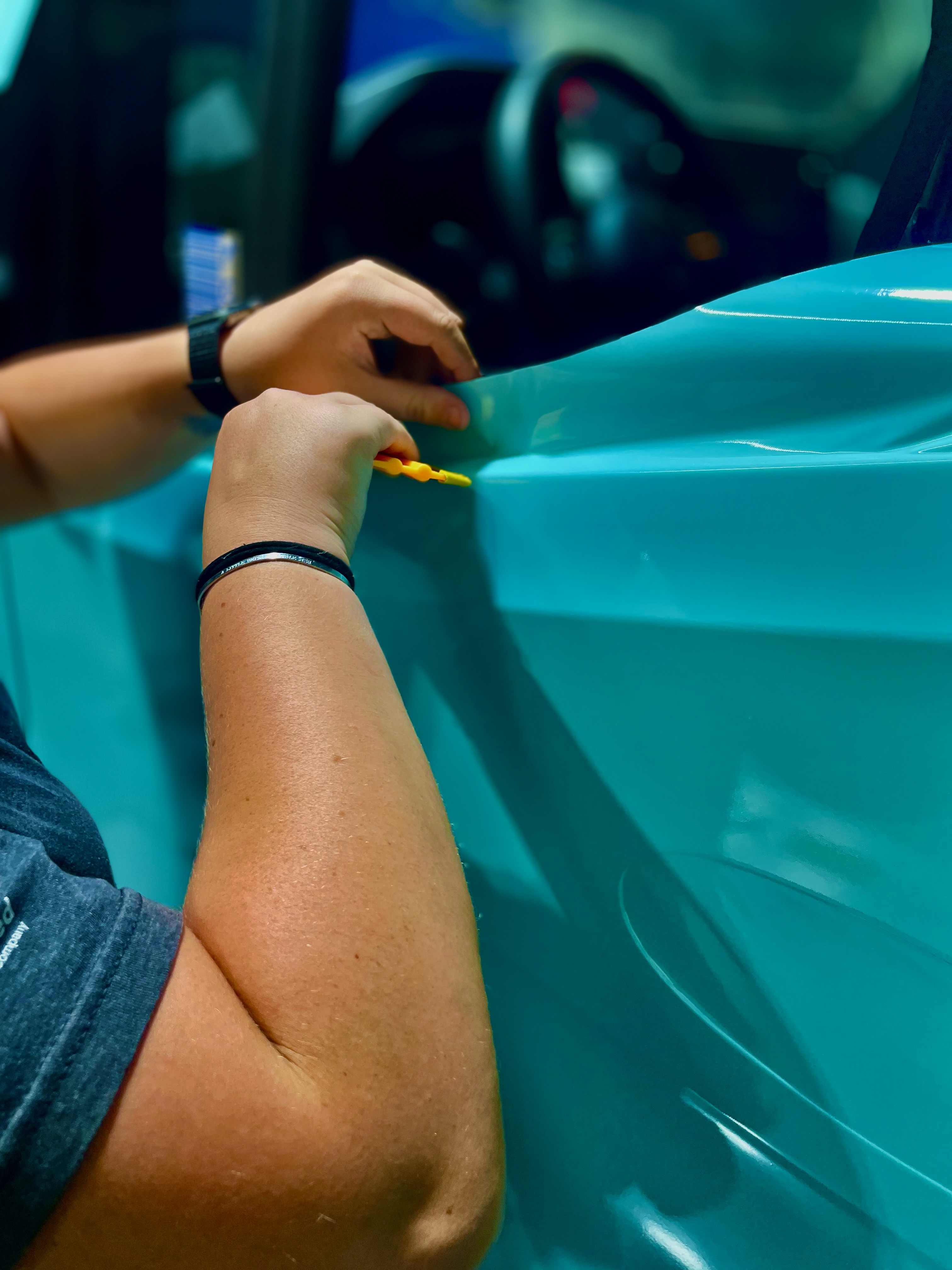 Bison Branding team installing fleet graphics